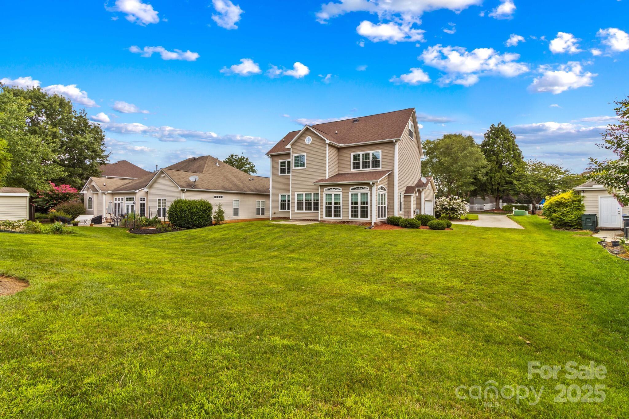 124 Elizabeth Hearth Road Mooresville, NC 28115 - Photo 45 of 48 a house view with a swimming pool