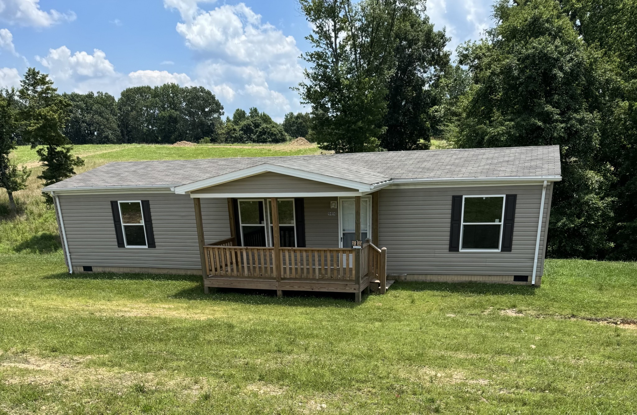 front view of a house with a yard