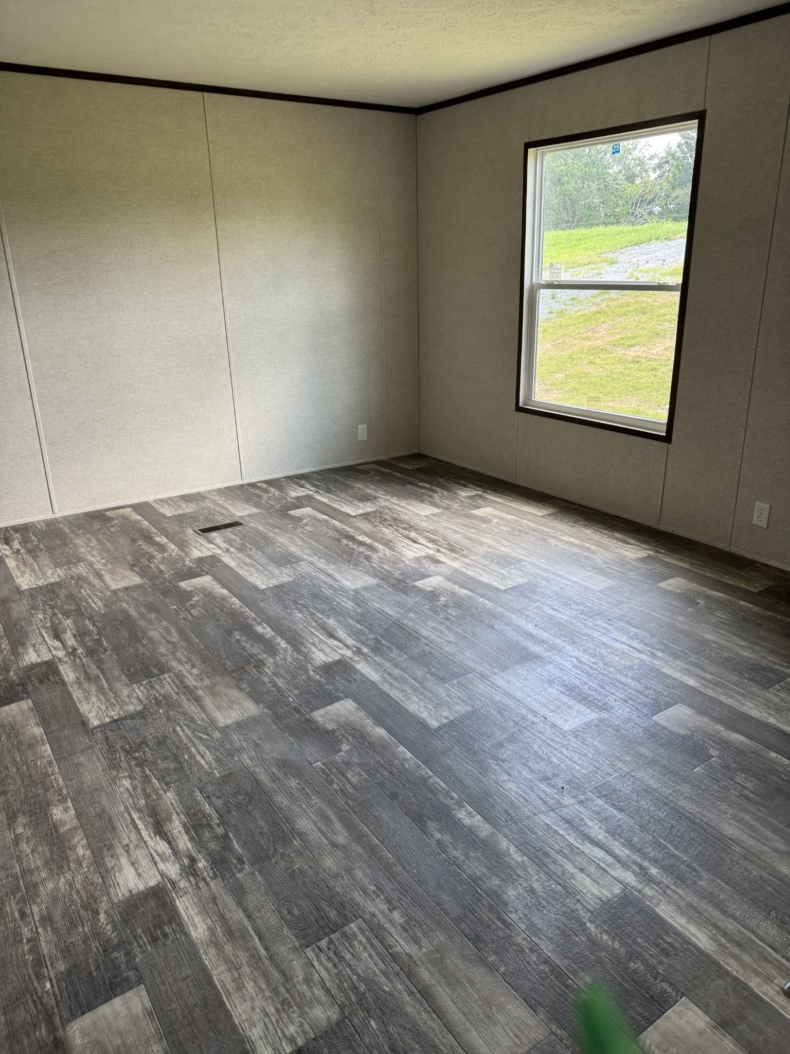 9494 Sunrise Road Red Boiling Springs, TN 37150 - Photo 6 of 10 a view of an empty room with a window