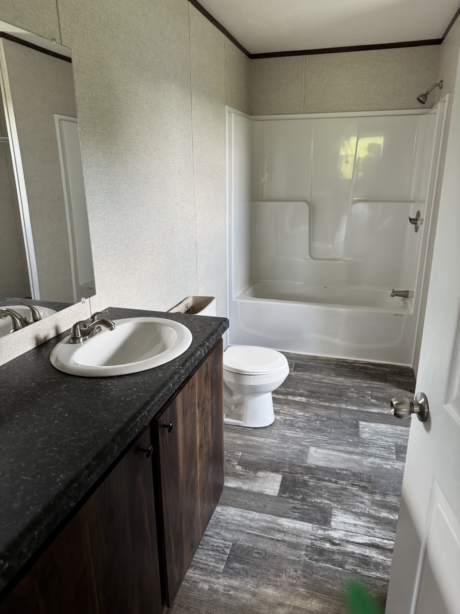 9494 Sunrise Road Red Boiling Springs, TN 37150 - Photo 7 of 10 a bathroom with a sink and a mirror