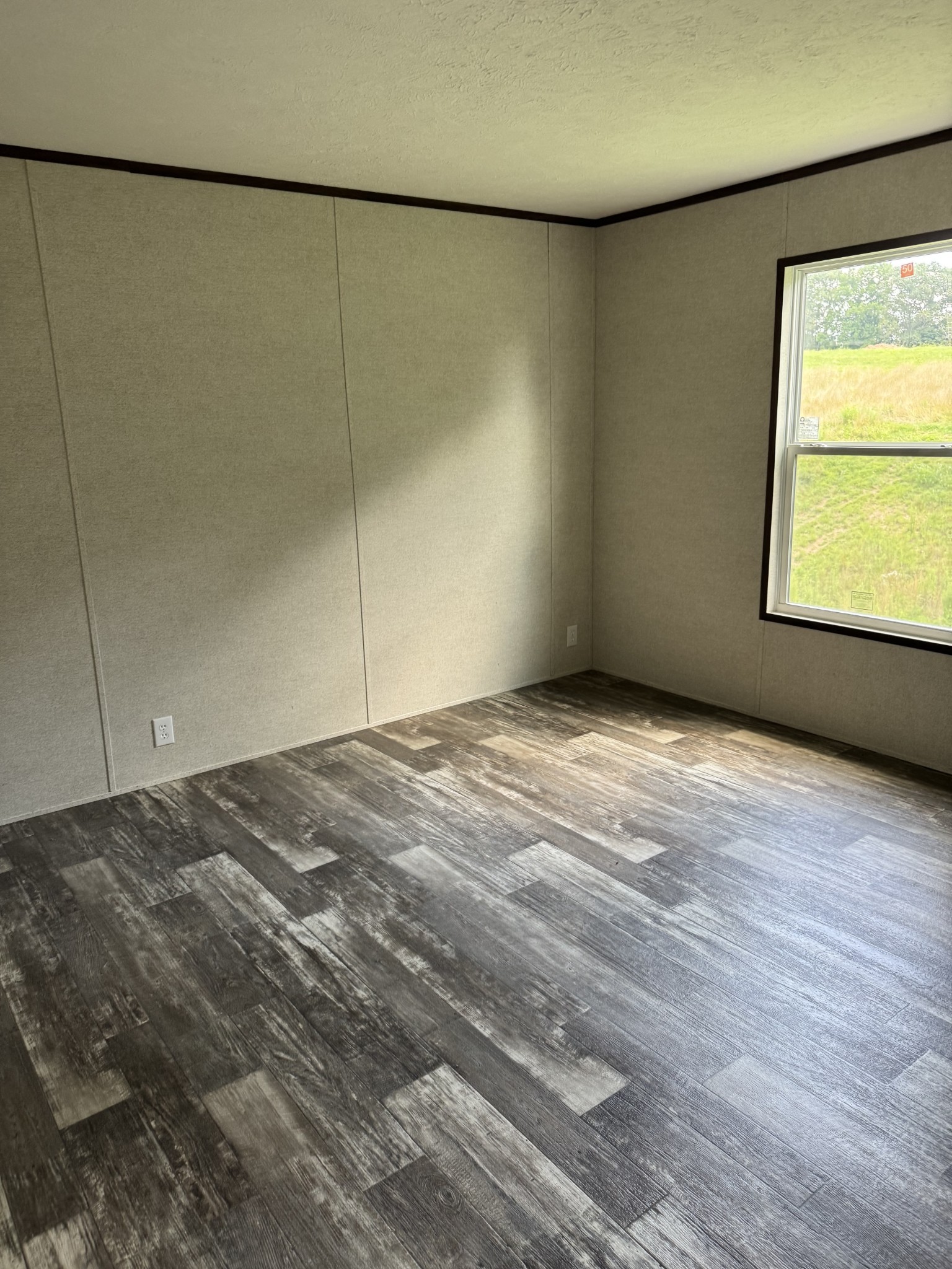 9494 Sunrise Road Red Boiling Springs, TN 37150 - Photo 10 of 10 a view of an empty room with a window