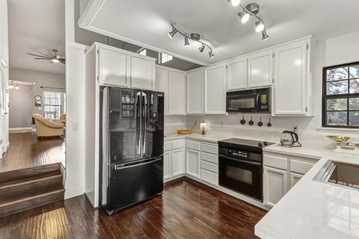 3901 Park Cir Lane, Unit B Carmichael, CA 95608 - Photo 15 of 40 a kitchen with a refrigerator stove and sink