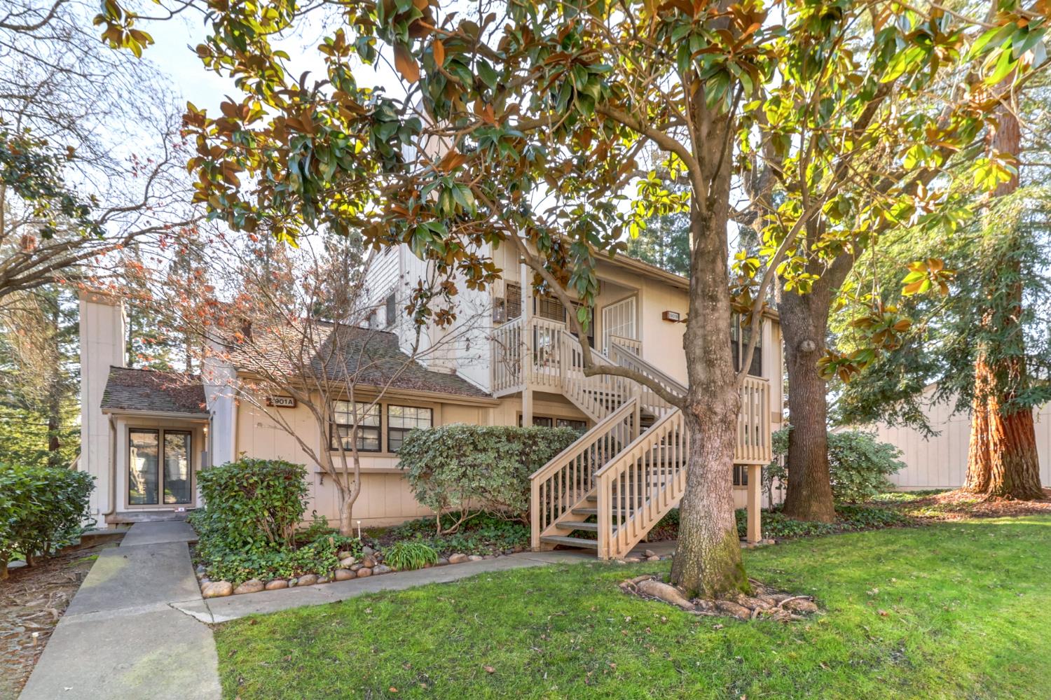 3901 Park Cir Lane, Unit B Carmichael, CA 95608 - Photo 2 of 40 a front view of a house with a yard
