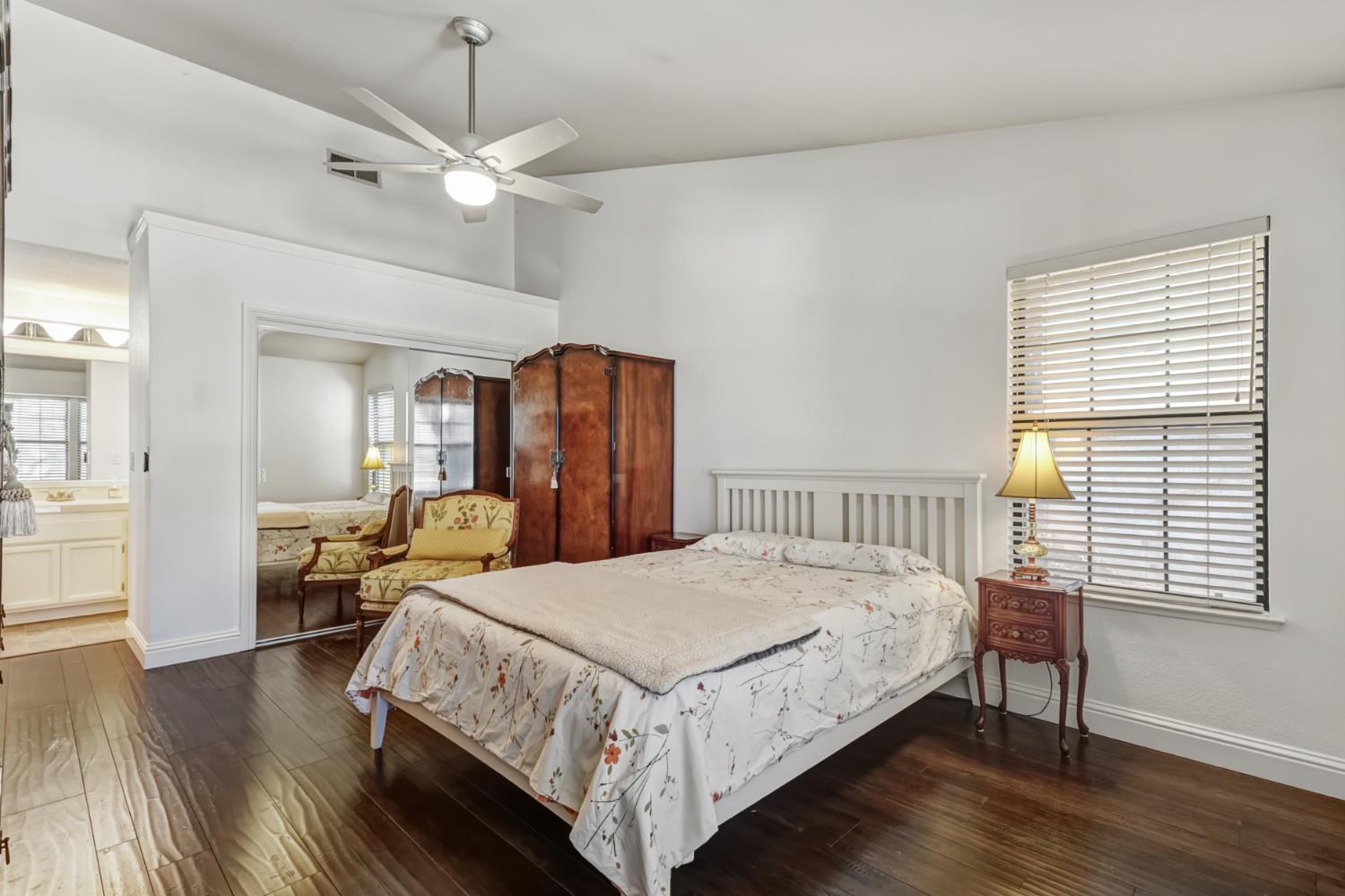 3901 Park Cir Lane, Unit B Carmichael, CA 95608 - Photo 21 of 40 a bedroom with a bed a chandelier and a window