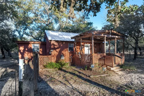 a room with furniture and a window