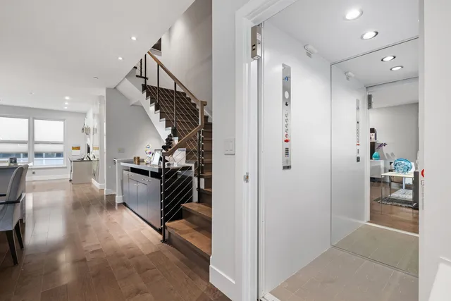 a view of a hallway view with living room