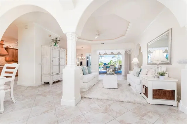 a utility room with cabinets washer and dryer