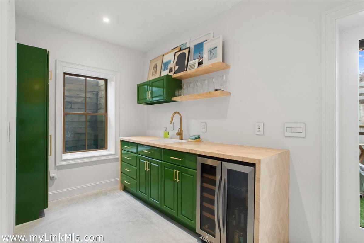 13 Parson Lane Nantucket, MA 02554 - Photo 23 of 44 a bathroom with a sink and a mirror