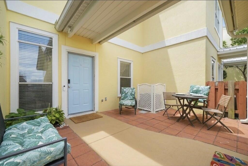450 South Geronimo Street, Unit 102 Miramar Beach, FL 32550 - Photo 36 of 39 front door bleached walkway