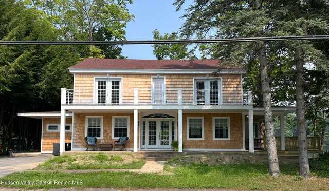 front view of house with a yard
