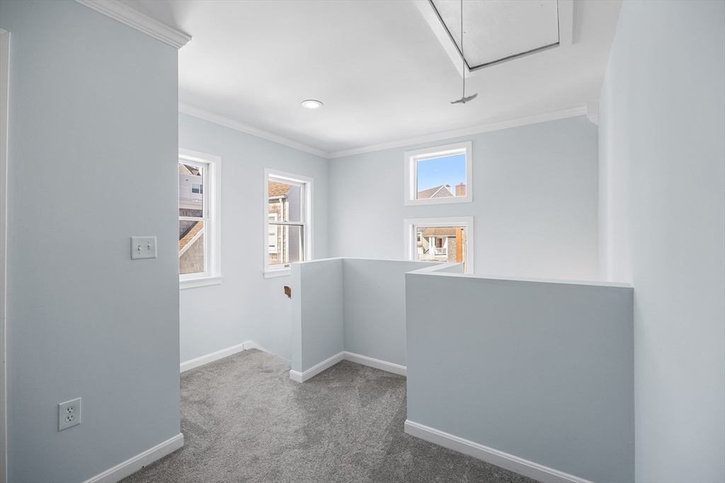 30 Commodore Court, Unit 30 Hull, MA 02045 - Photo 14 of 42 a view of an empty room with window