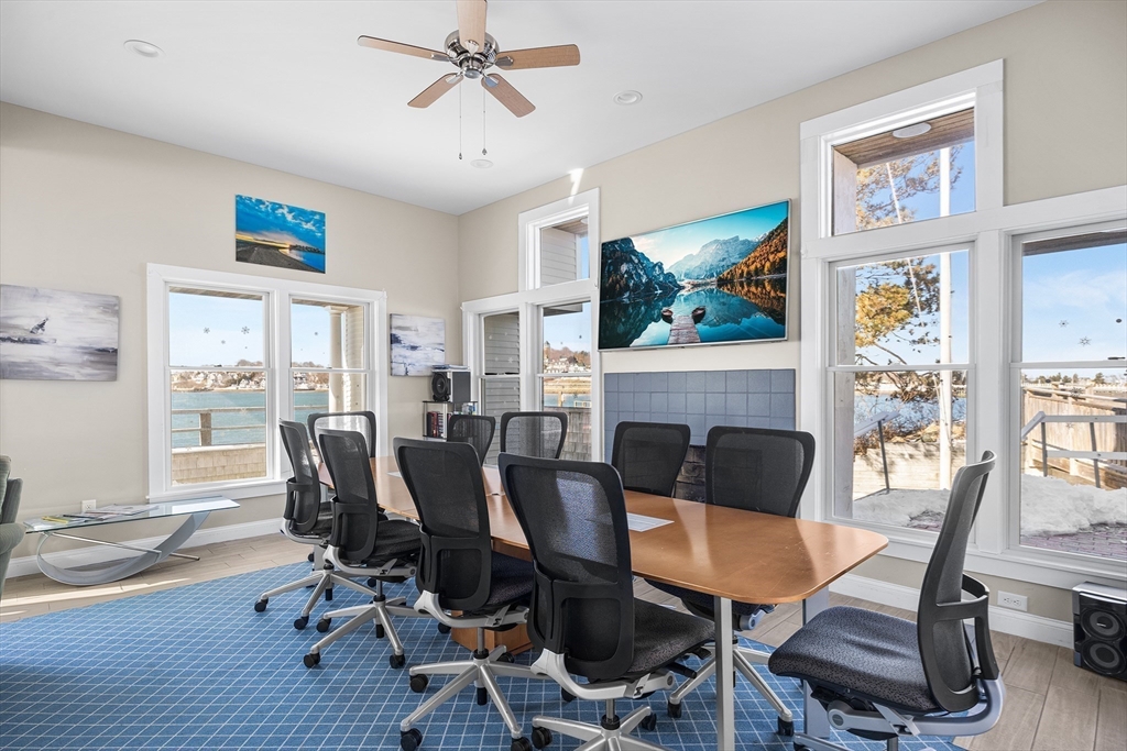30 Commodore Court, Unit 30 Hull, MA 02045 - Photo 32 of 42 a view of a dining room with furniture window and wooden floor