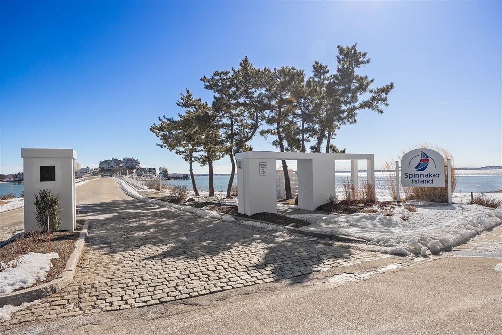 30 Commodore Court, Unit 30 Hull, MA 02045 - Photo 40 of 42 a view of a house with a yard
