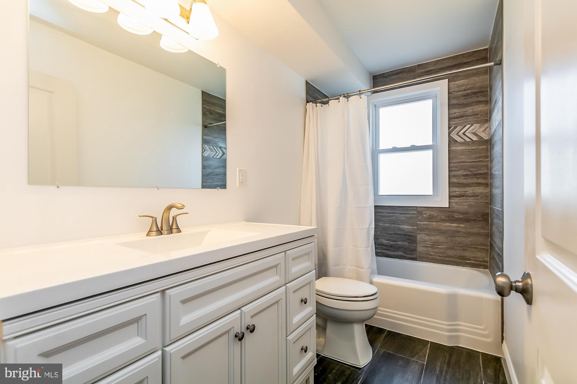 4123 Eder Road Baltimore, MD 21222 - Photo 13 of 31 1st Floor Hall Bath