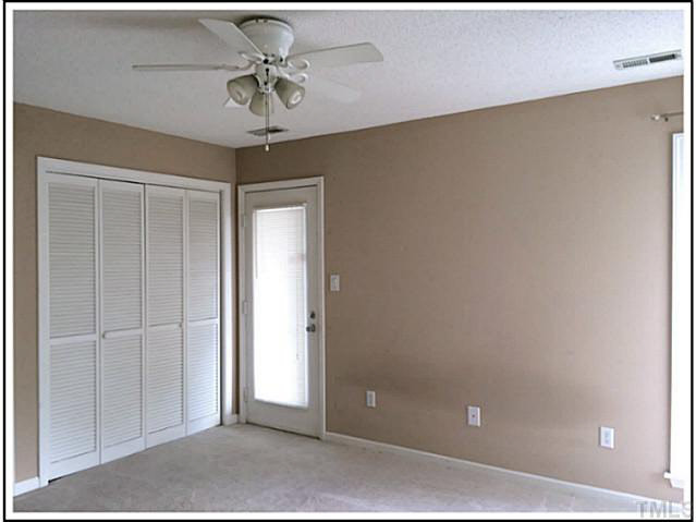 4601 Timbermill Court, Unit 301 Raleigh, NC 27612 - Photo 6 of 8 The master bedroom has its own bath and a back balcony with storage room.