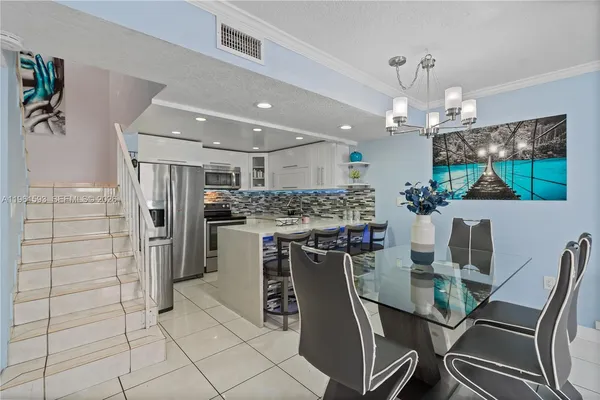 a view of a dining room with furniture