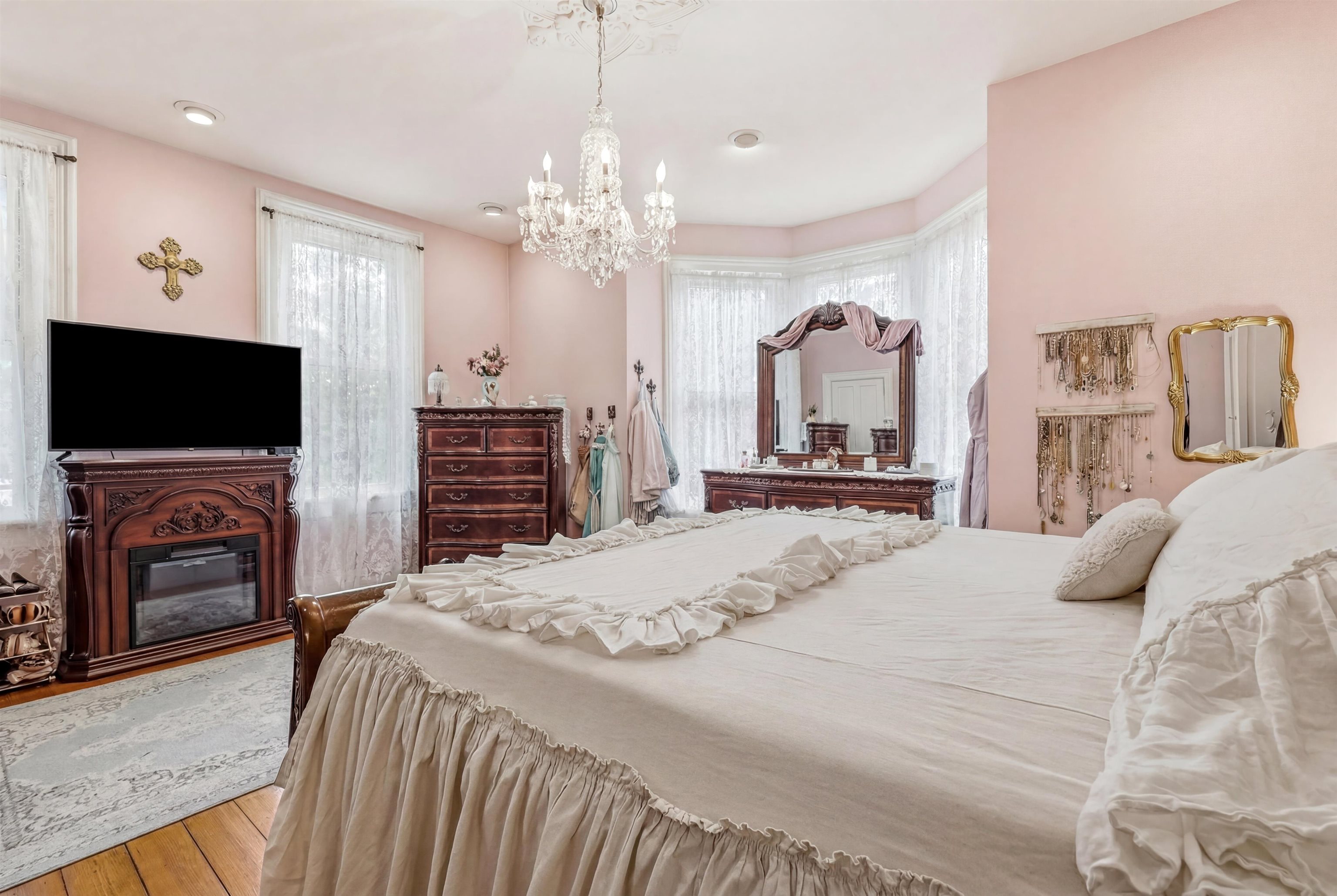 2562 West Blackjack Road Galena, IL 61036 - Photo 30 of 75 a bedroom with a bed and a flat screen tv