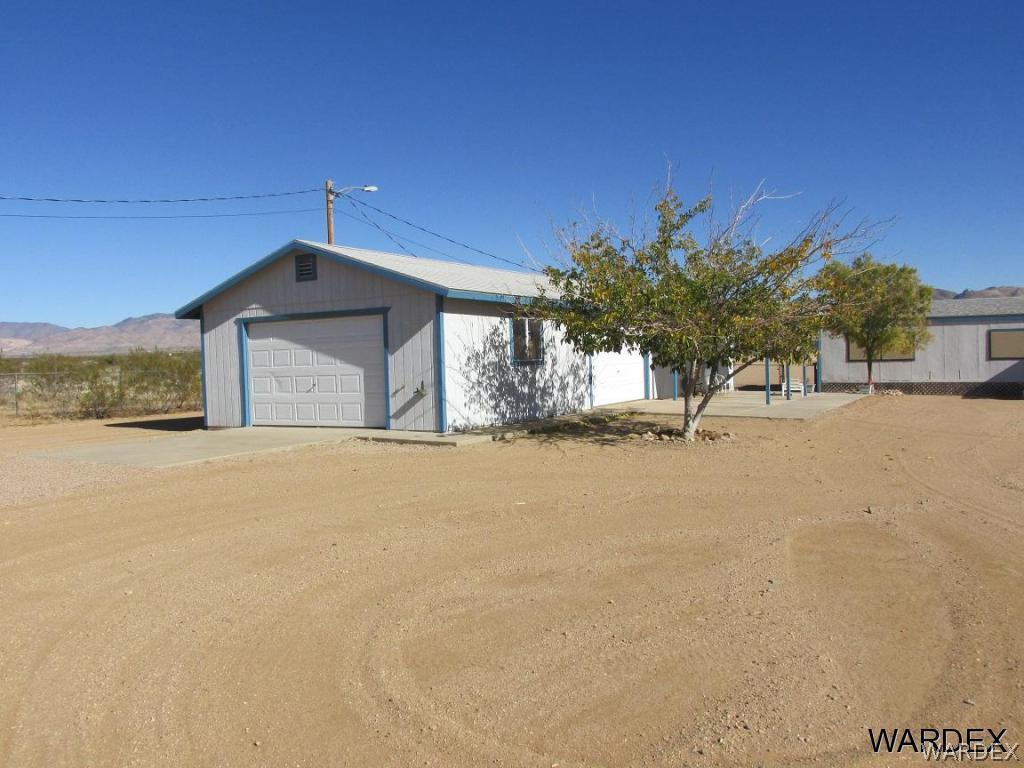 3936 Tonto Road Golden Valley, AZ 86413 - Photo 29 of 29 a view of a house with a snow yard