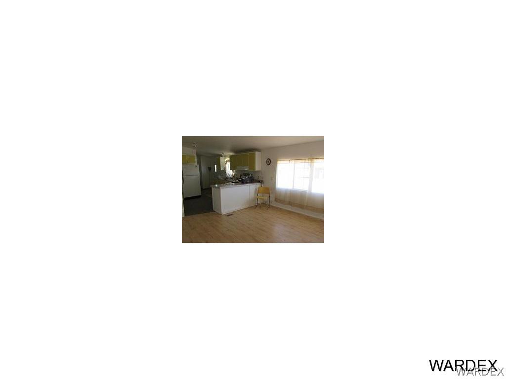 3936 Tonto Road Golden Valley, AZ 86413 - Photo 5 of 29 a picture of a bench in a room