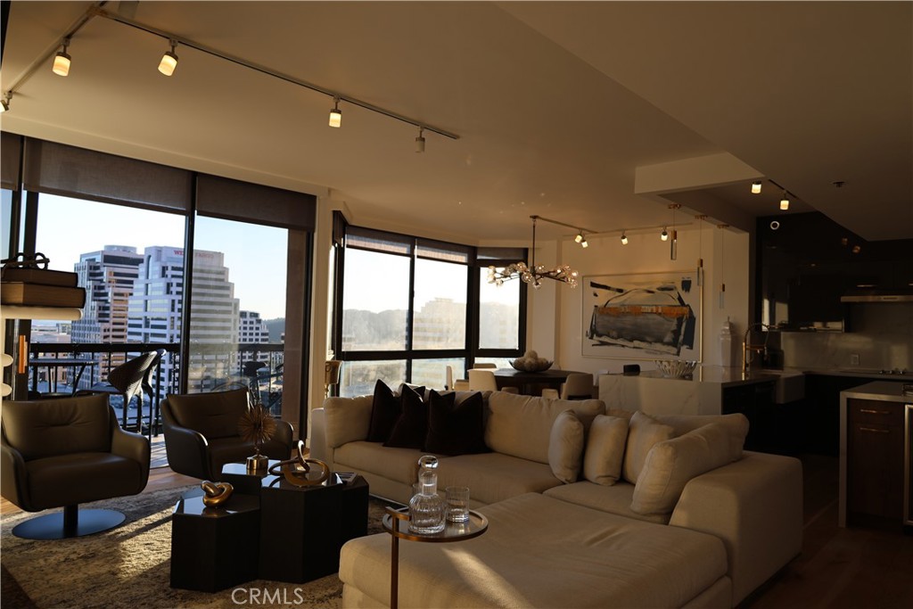 222 Monterey Road, Unit 1603 Glendale, CA 91206 - Photo 14 of 38 a living room with furniture and a large window
