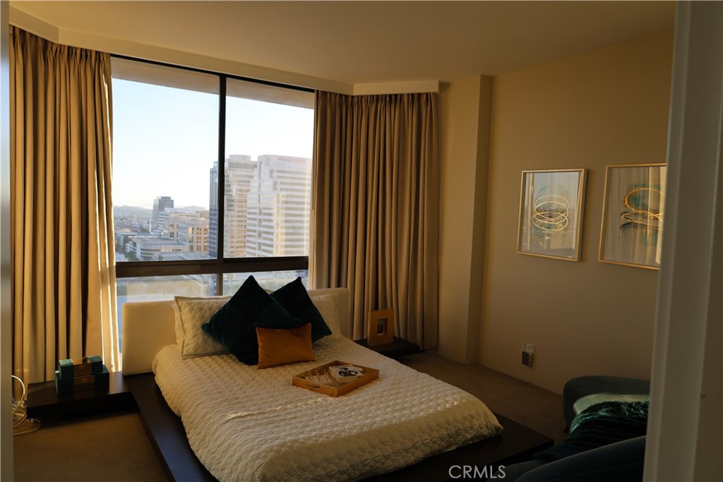 222 Monterey Road, Unit 1603 Glendale, CA 91206 - Photo 16 of 38 a bedroom with a bed and window