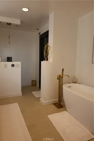 a bathroom with a shower and toilet