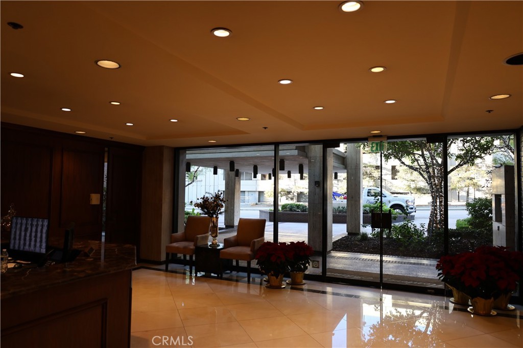 222 Monterey Road, Unit 1603 Glendale, CA 91206 - Photo 30 of 38 a lobby with furniture and floor to ceiling window