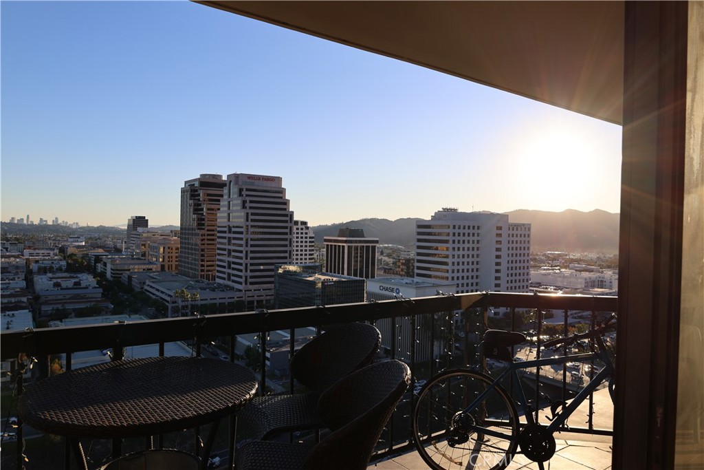 222 Monterey Road, Unit 1603 Glendale, CA 91206 - Photo 4 of 38 a view of a balcony with an outdoor seating