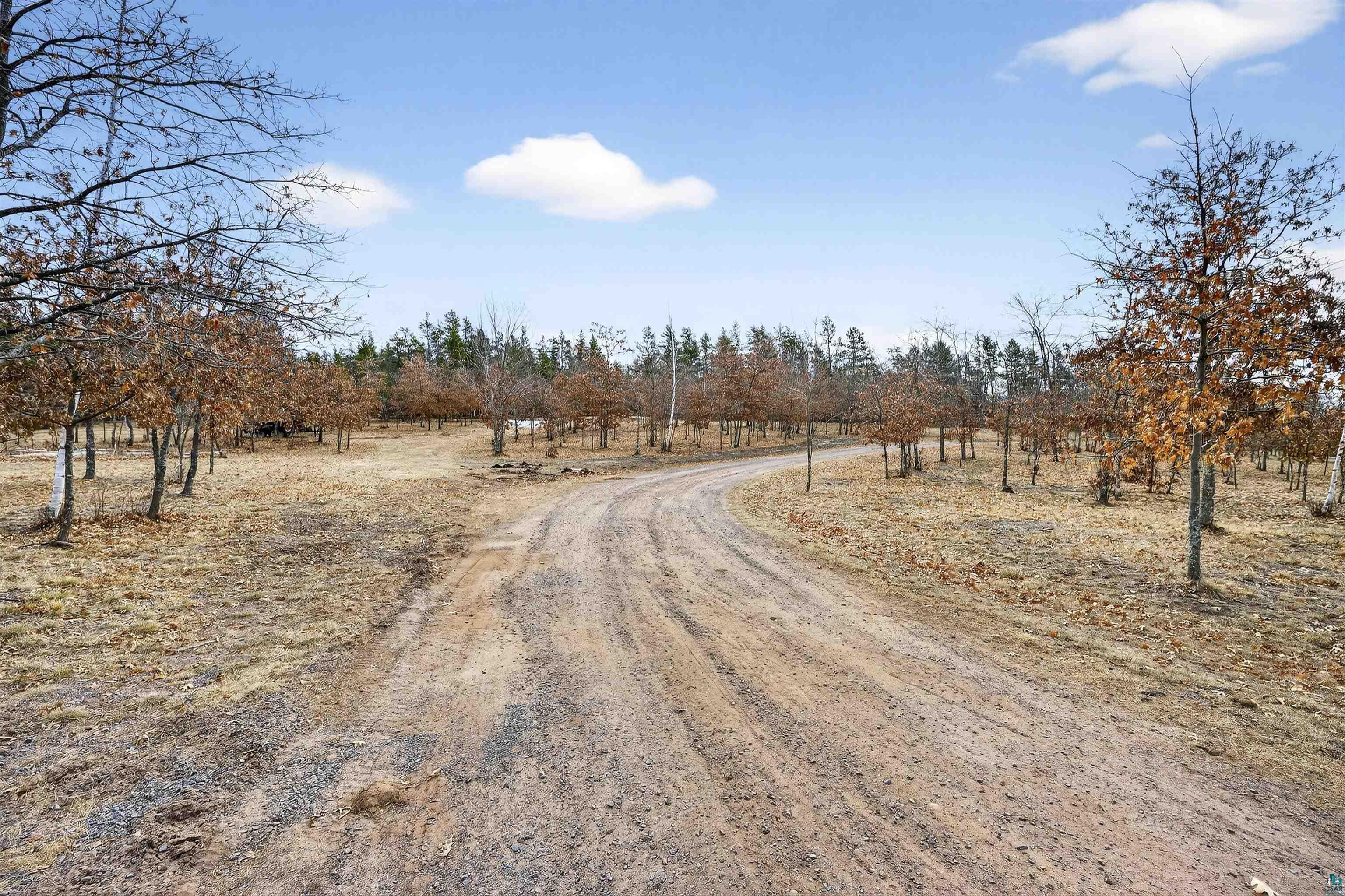 11702 East Mail Road Gordon, WI 54838 - Photo 18 of 43 View of dirt / gravel road with a view of countryside
