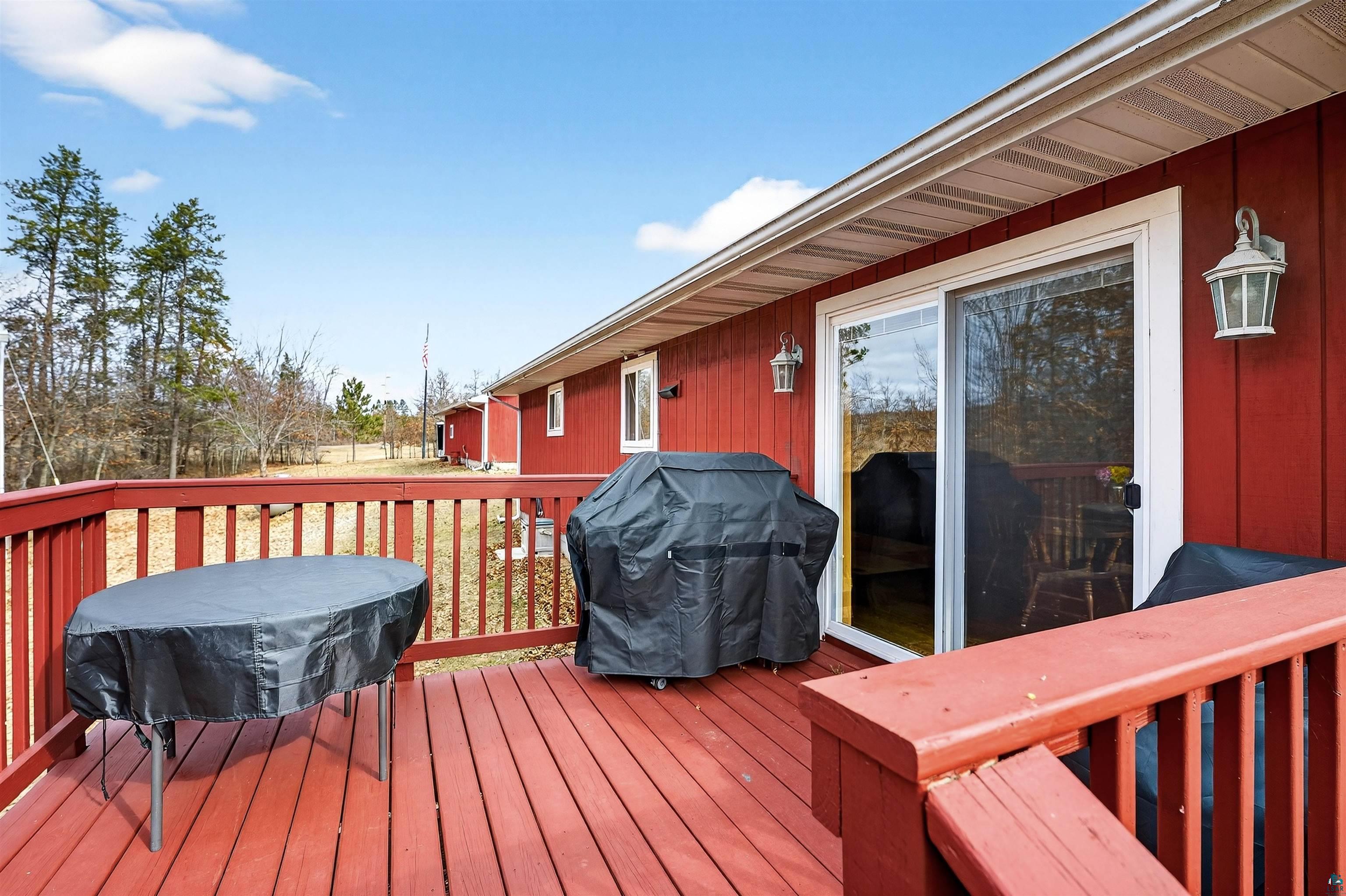11702 East Mail Road Gordon, WI 54838 - Photo 6 of 43 Wooden terrace featuring a grill