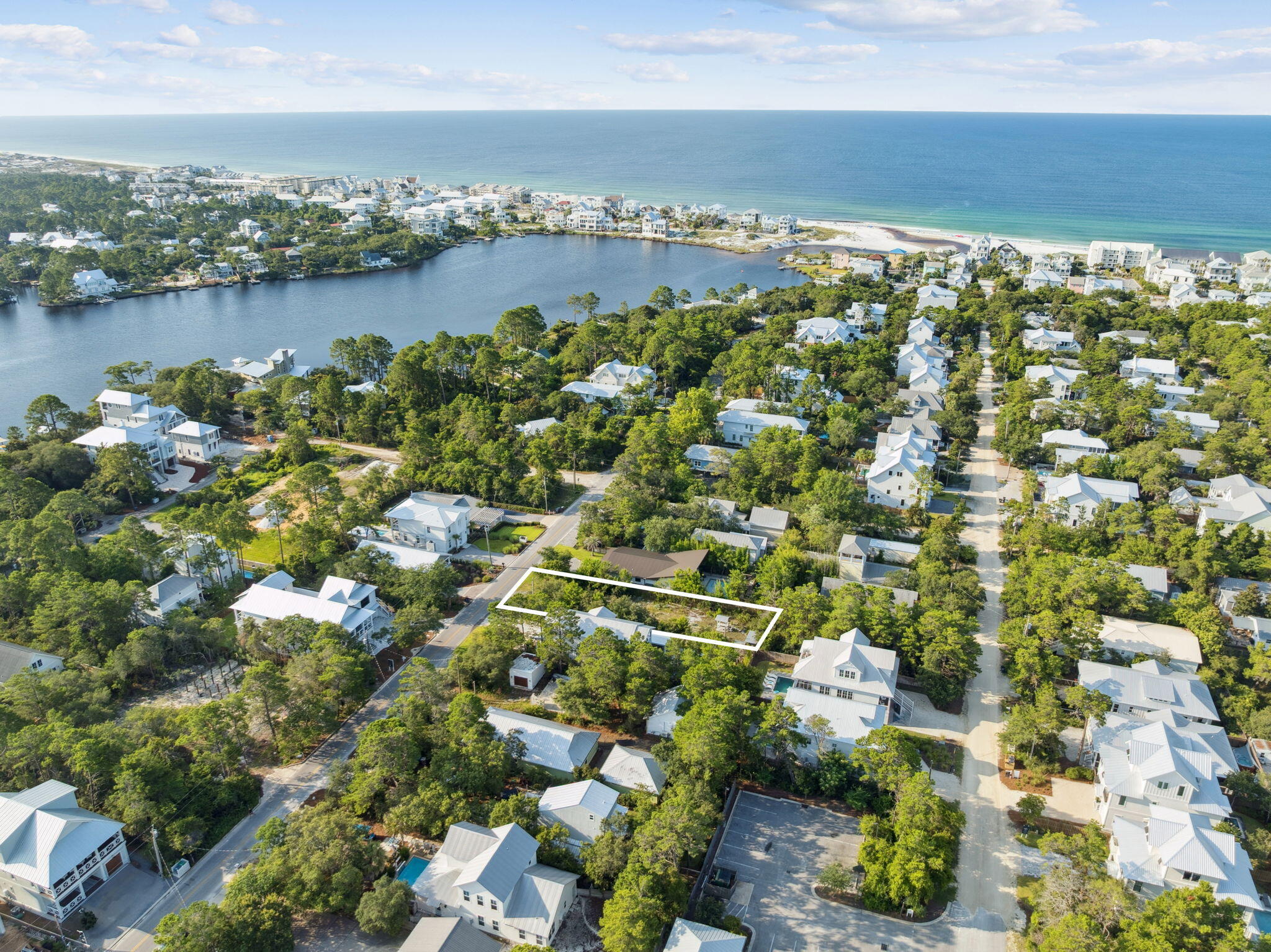 86 South Gulf Drive Santa Rosa Beach, FL 32459 - Photo 4 of 8 a view of a lake with a city