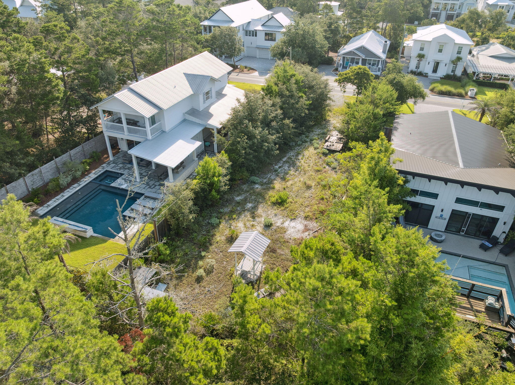 86 South Gulf Drive Santa Rosa Beach, FL 32459 - Photo 7 of 8 an aerial view of house with yard swimming pool and outdoor seating