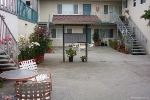 445 Esplanade Avenue, Unit 2 Pacifica, CA 94044 - Photo 2 of 10 a view of a house with patio