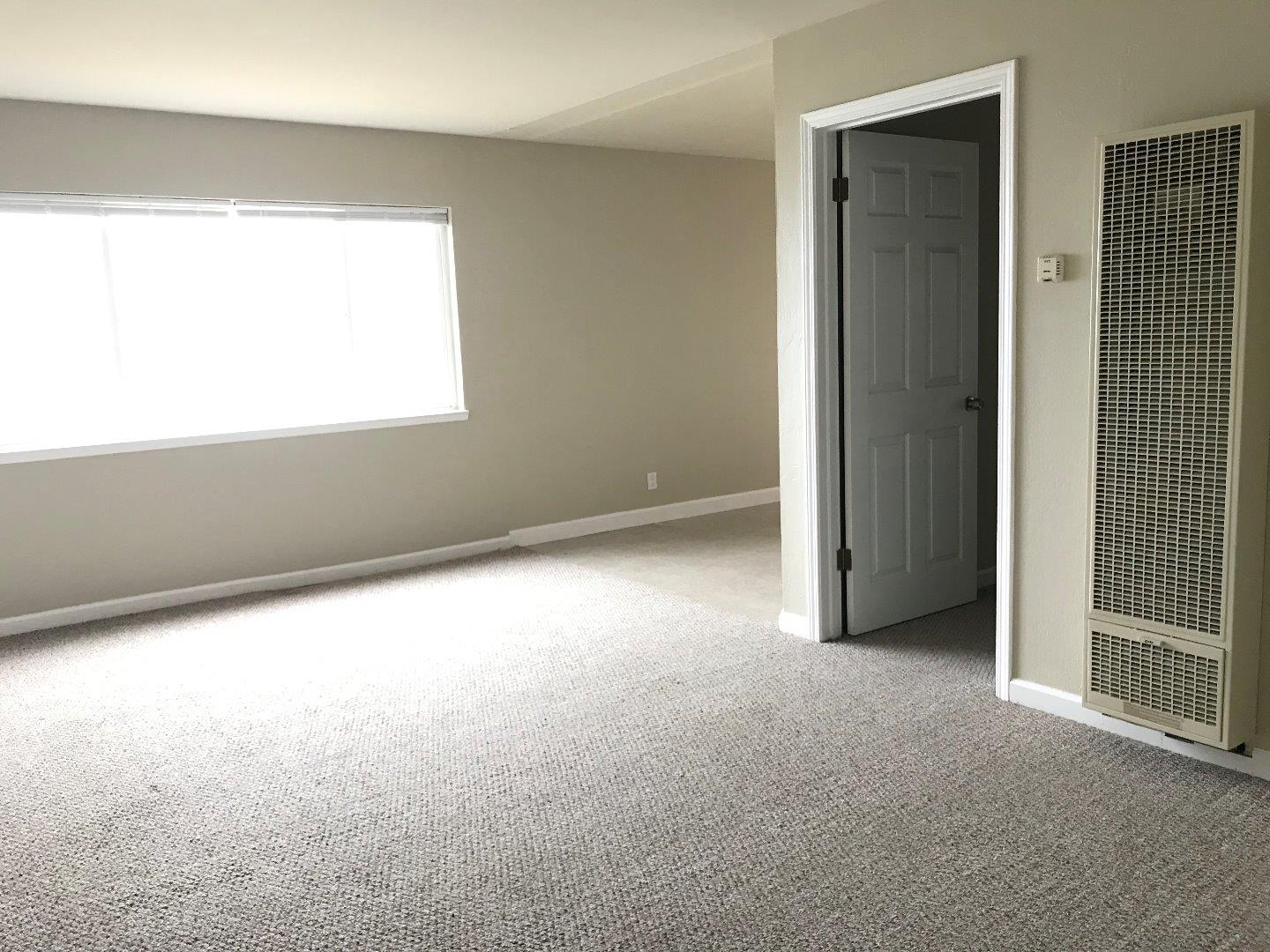 445 Esplanade Avenue, Unit 2 Pacifica, CA 94044 - Photo 3 of 10 an empty room with windows