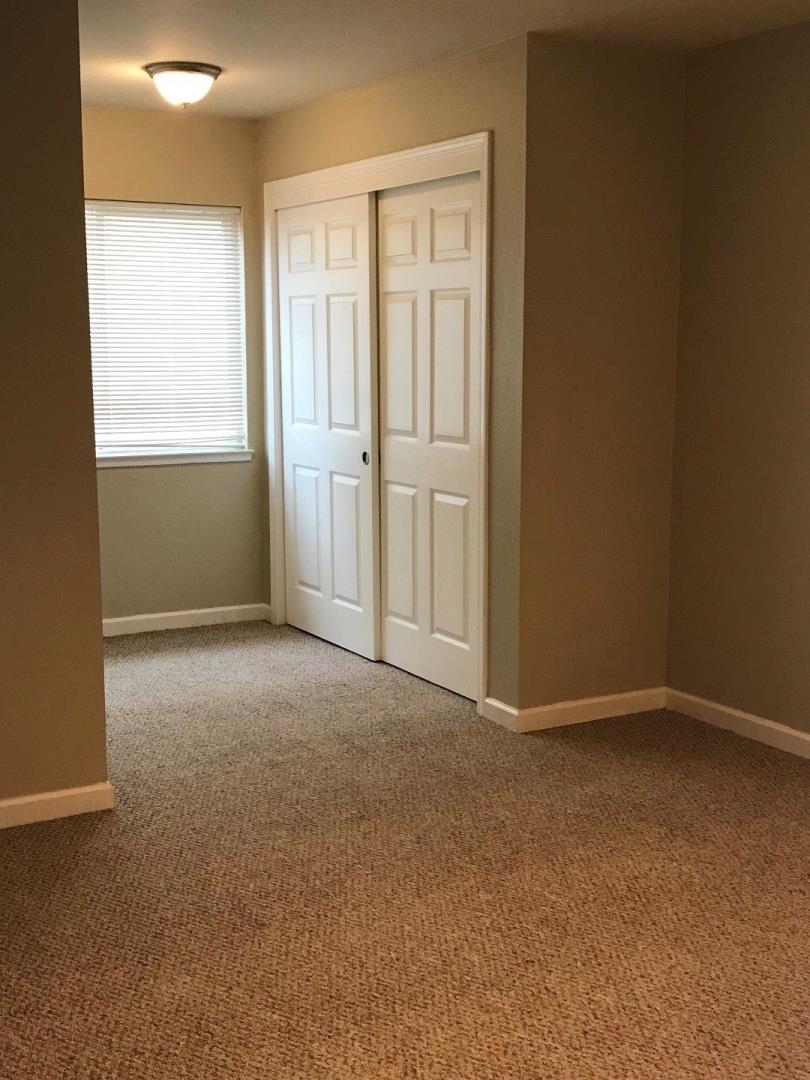 445 Esplanade Avenue, Unit 2 Pacifica, CA 94044 - Photo 7 of 10 an empty room with windows