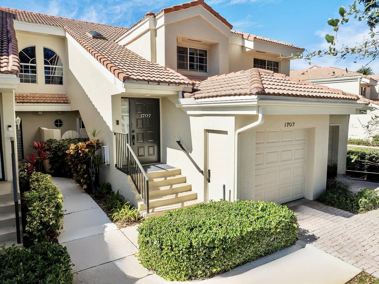 a view of a house with outdoor seating area