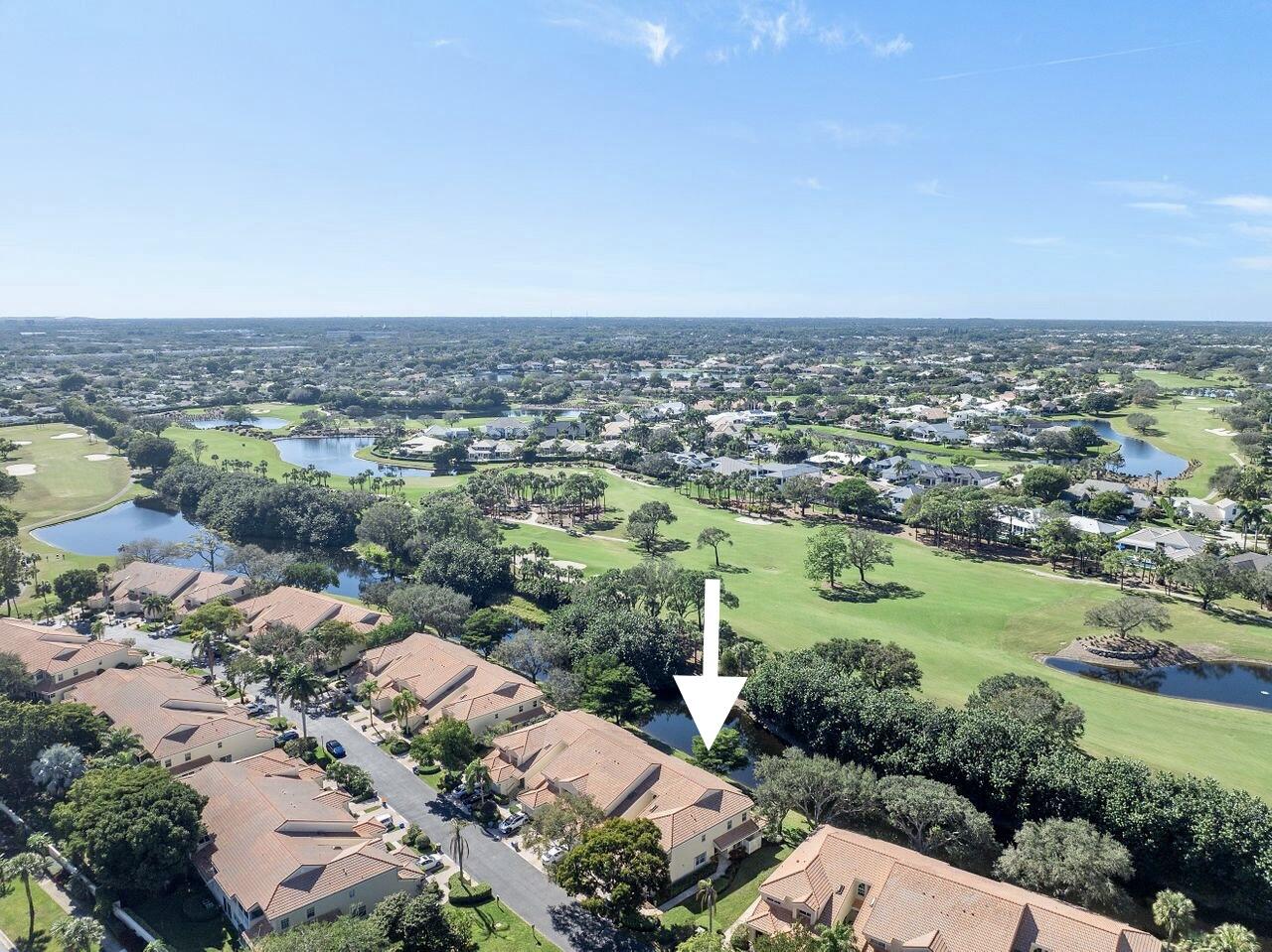 17270 Boca Club Boulevard, Unit 1707 Boca Raton, FL 33487 - Photo 40 of 68 an aerial view of a residential houses with outdoor space and trees