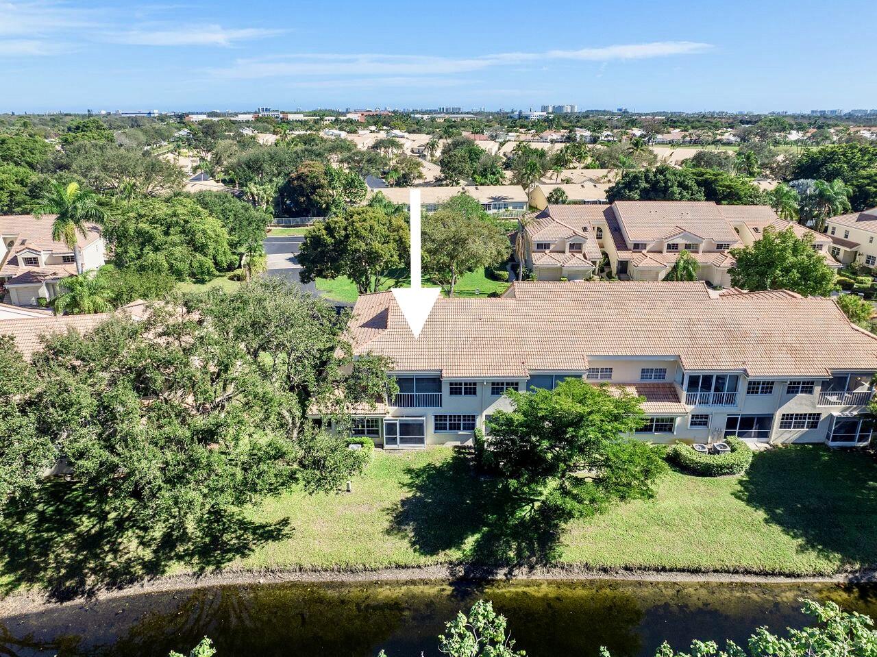 17270 Boca Club Boulevard, Unit 1707 Boca Raton, FL 33487 - Photo 41 of 68 an aerial view of residential houses with outdoor space and trees