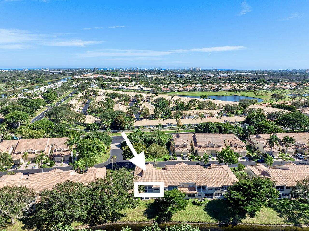 17270 Boca Club Boulevard, Unit 1707 Boca Raton, FL 33487 - Photo 43 of 68 an aerial view of residential houses with outdoor space