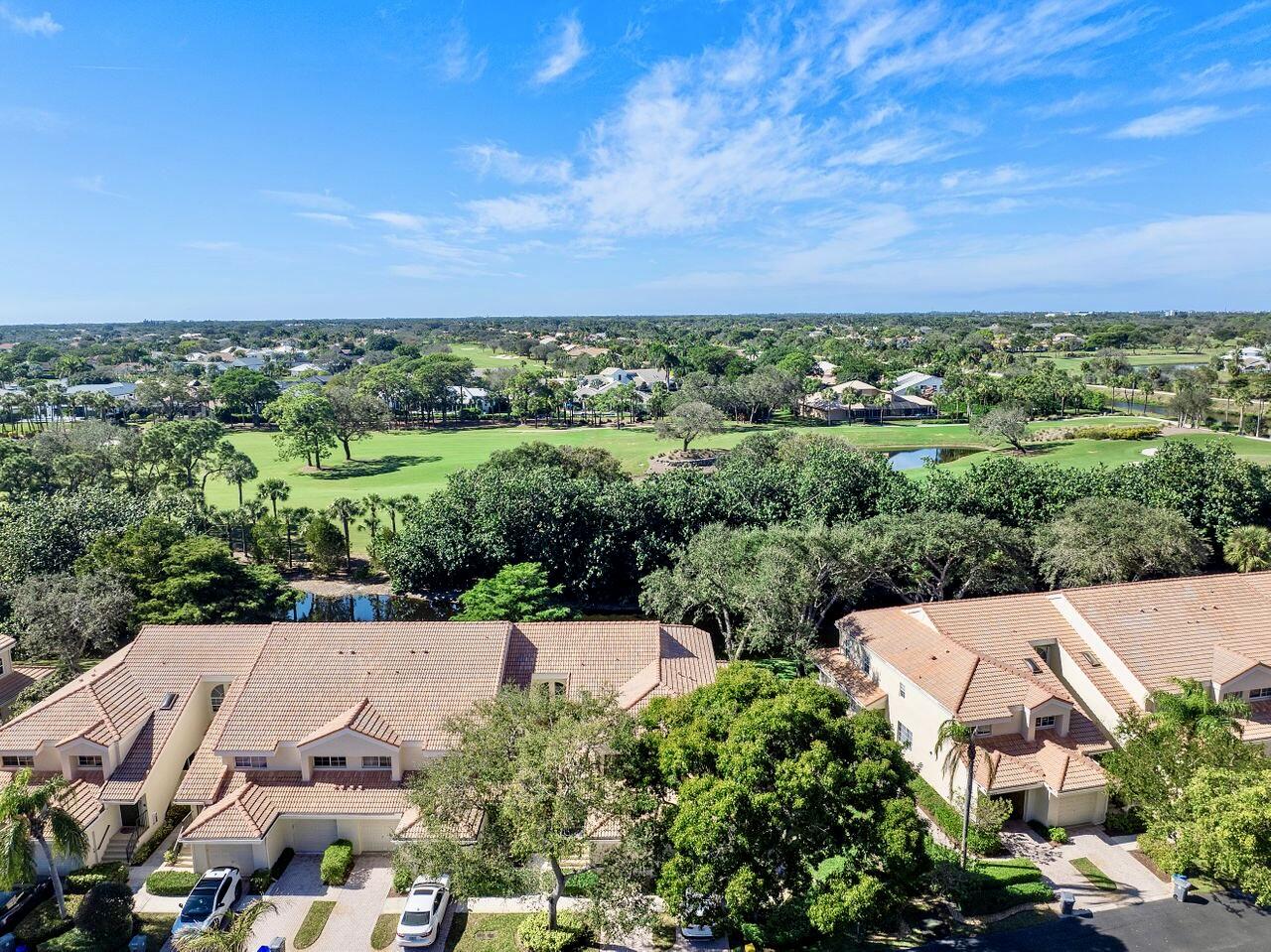 17270 Boca Club Boulevard, Unit 1707 Boca Raton, FL 33487 - Photo 44 of 68 an aerial view of a house with a garden