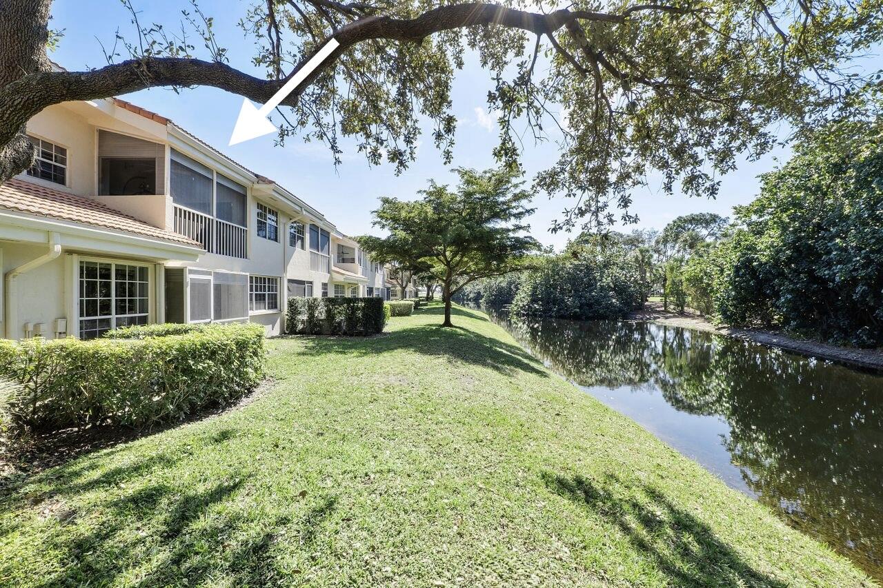 17270 Boca Club Boulevard, Unit 1707 Boca Raton, FL 33487 - Photo 51 of 68 a view of a house with a yard