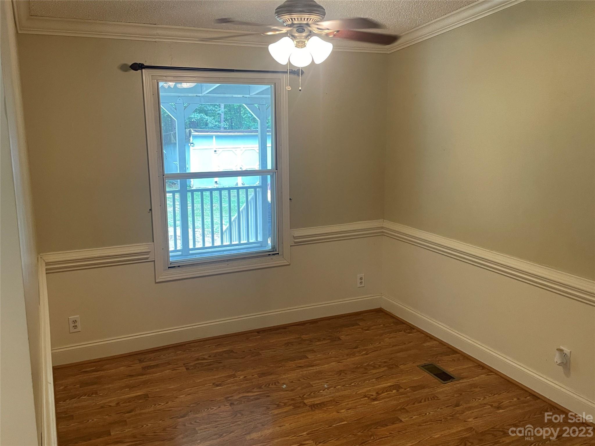 3850 Winter Road Rock Hill, SC 29730 - Photo 8 of 20 a view of a room with a window and chandelier fan