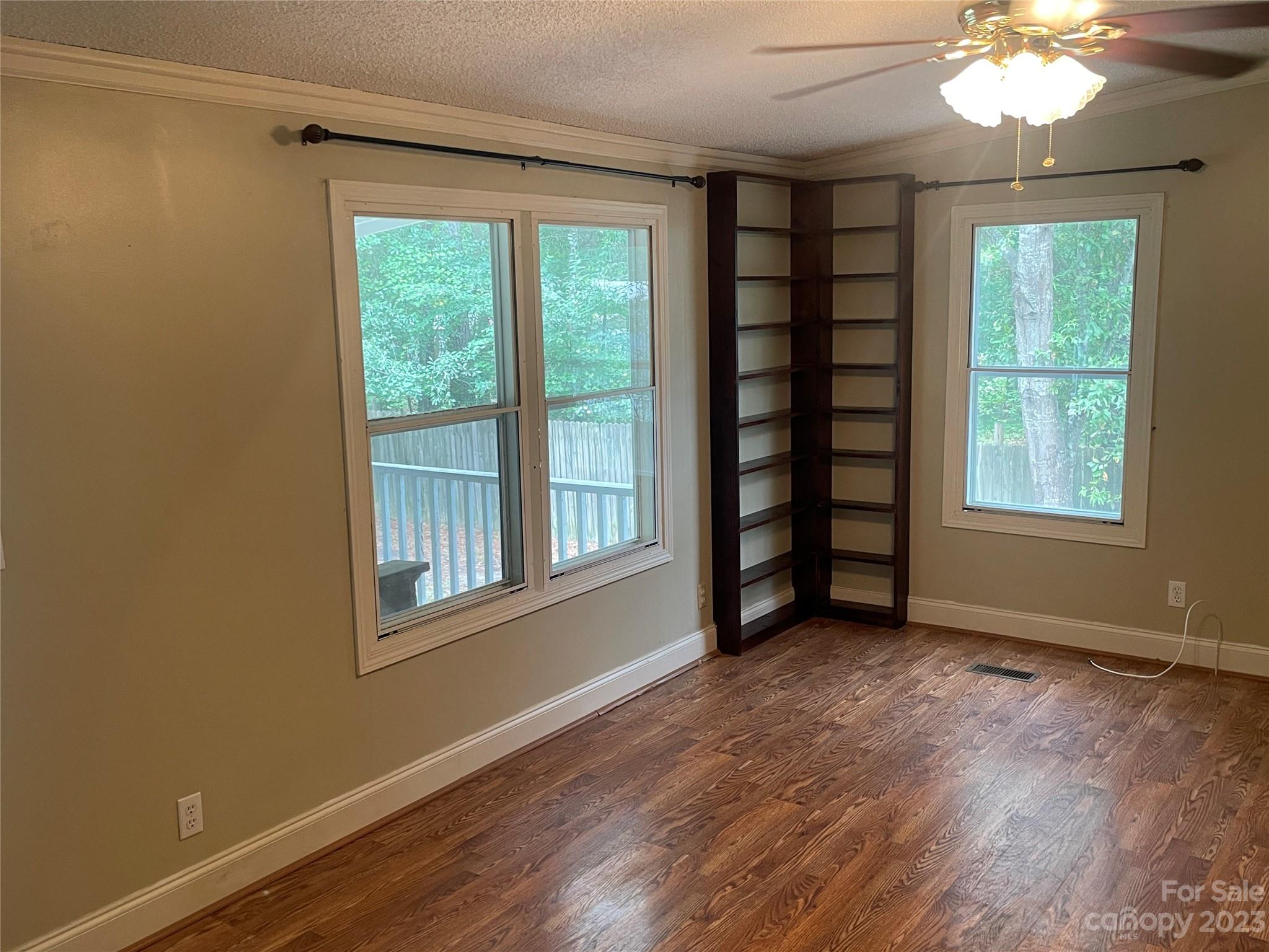3850 Winter Road Rock Hill, SC 29730 - Photo 10 of 20 a view of an empty room with a window and wooden floor