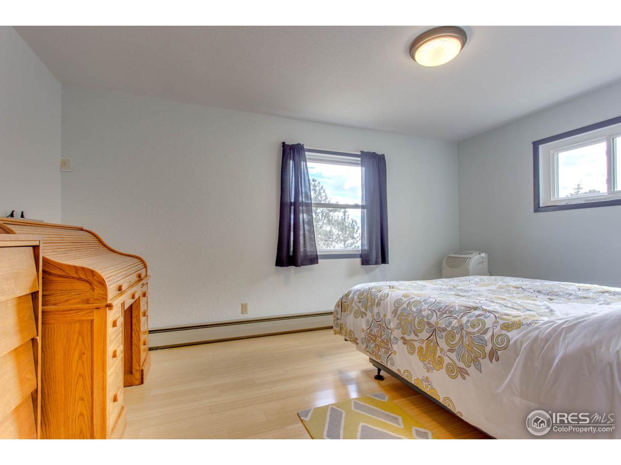 6137 Olde Stage Road Boulder, CO 80302 - Photo 14 of 27 Light & Bright Master Bedroom