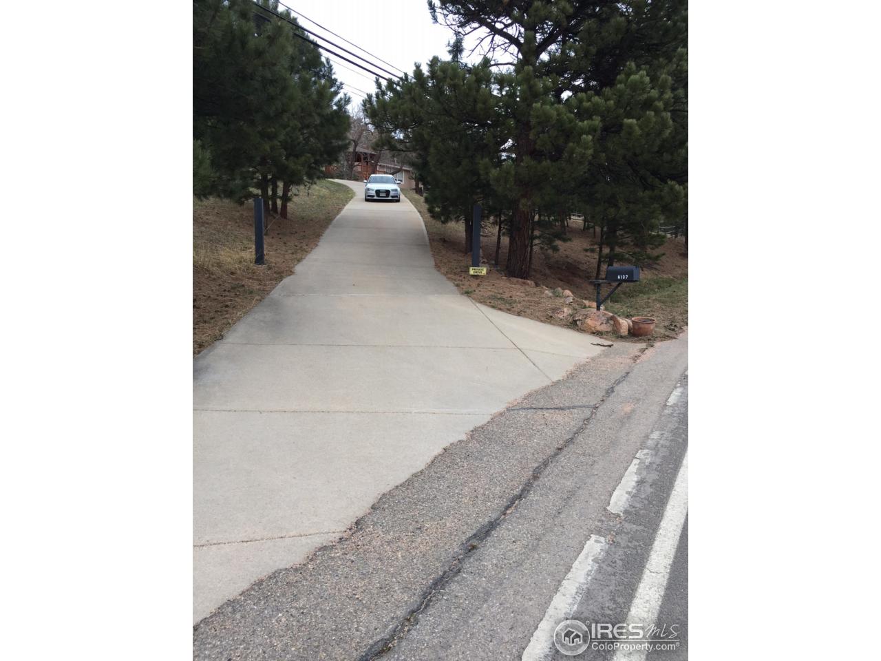 6137 Olde Stage Road Boulder, CO 80302 - Photo 26 of 27 All concrete drive, big pad up top to turnaround!
