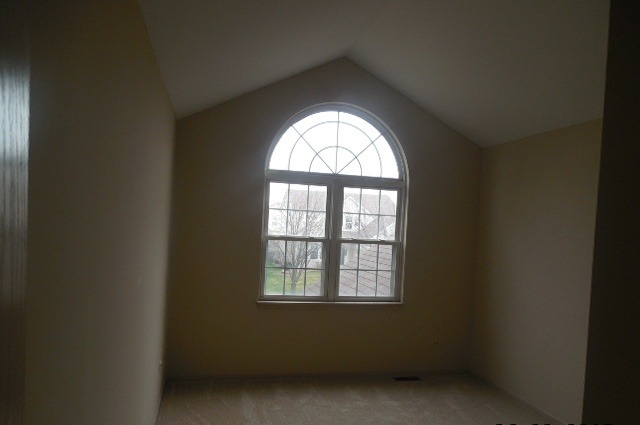 152 Sedgewicke Drive Romeoville, IL 60446 - Photo 12 of 16 an empty room with a window