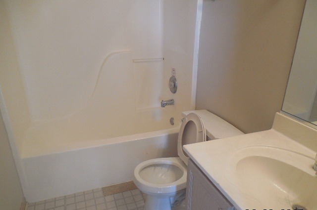152 Sedgewicke Drive Romeoville, IL 60446 - Photo 14 of 16 a bathroom with a sink and a toilet