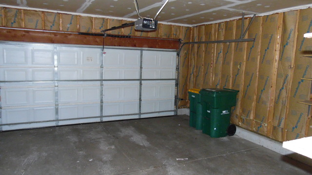 152 Sedgewicke Drive Romeoville, IL 60446 - Photo 16 of 16 a view of a room with racks on the wall