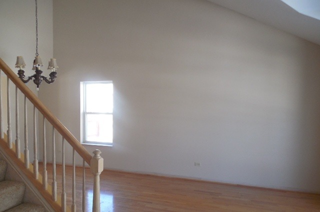 152 Sedgewicke Drive Romeoville, IL 60446 - Photo 3 of 16 a view of a hallway with a window