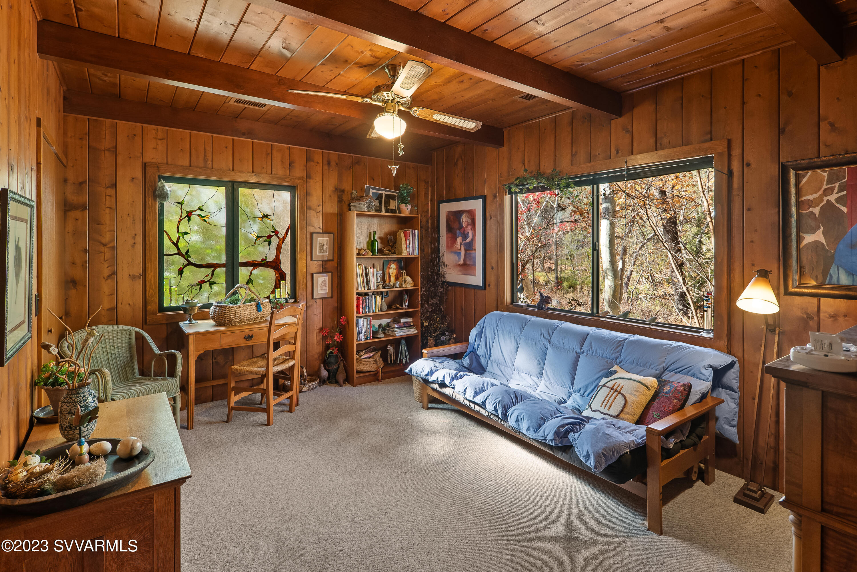 45 Copper Cliffs Lane Sedona, AZ 86336 - Photo 17 of 39 a living room with furniture and a large window